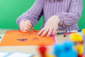 little girl drawing a picture